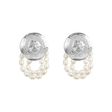 Paola Vilas sterling silver nipple earring with strands of natural pearls