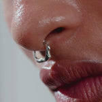 Video of a model wearing a female body piercing in sterling silver