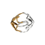 Sculptural ring of intertwined dancing bodies in sterling silver with 18k gold plating