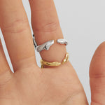 Details of sterling silver rings of a melted female body