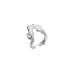 Sterling silver ring of a melted female body