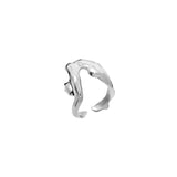 Sterling silver ring of a melted female body