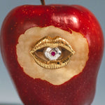 Surreal sterling silver ring with 18k gold plating of a mouth and eye with a ruby