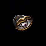 Ring with ruby in 925 silver with gold plating of mouth and eye