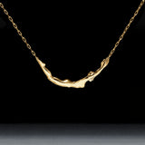 Paola Vilas necklace in sterling silver with 18k gold plating of a female body